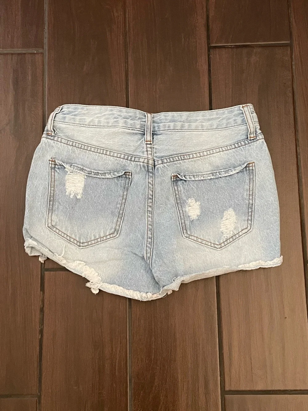 Light Wash Distressed Denim Shorts